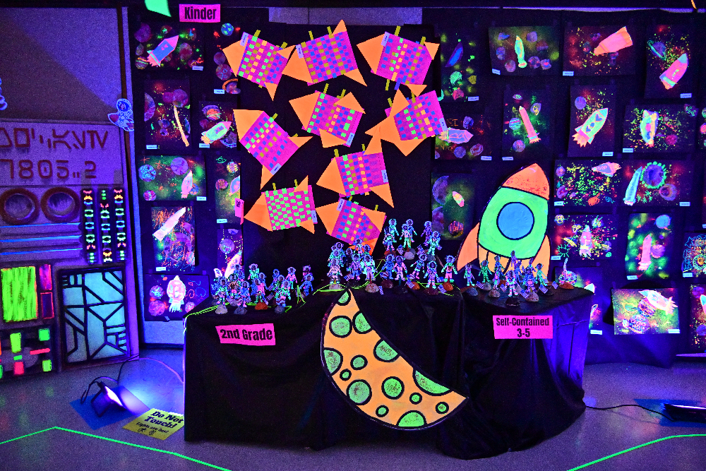 Glow art depicting rocketships